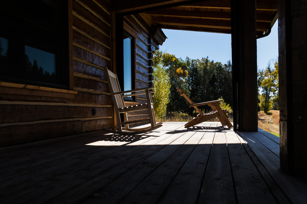 front porch with rocking chairs at double t ranch in montana