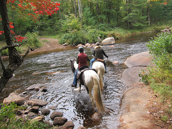 creek crossing on horseback at otter creek