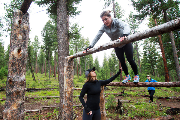 women complete the grizzlyman fitness trail at the resort at paws up