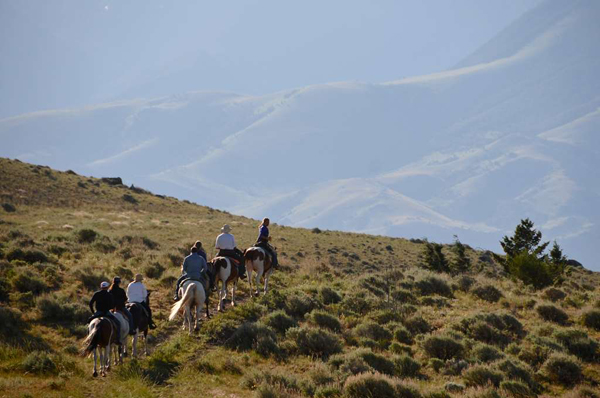 group trail ride at mountain sky guest ranch in montana