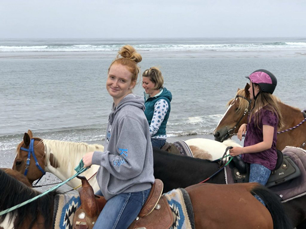 horseback beach ride group