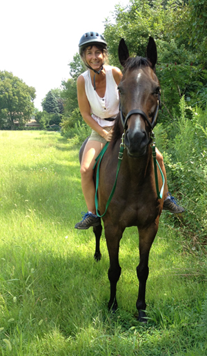 Juliette Ober horseback riding bitless bridle