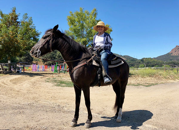 senior woman on horseback 