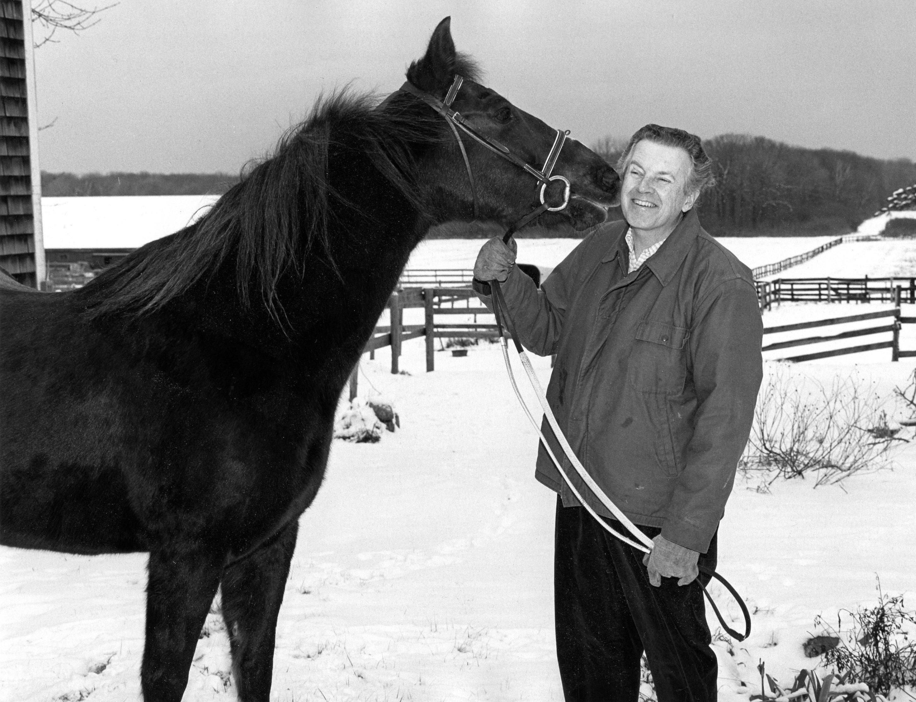 Water's grandfather, Norman, with horse