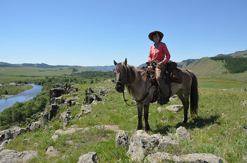 Sabine on “Good Boy” in Gorkhi Terelj National Park enjoying the view from a highpoint enroute to the Khentii mountains wilderness