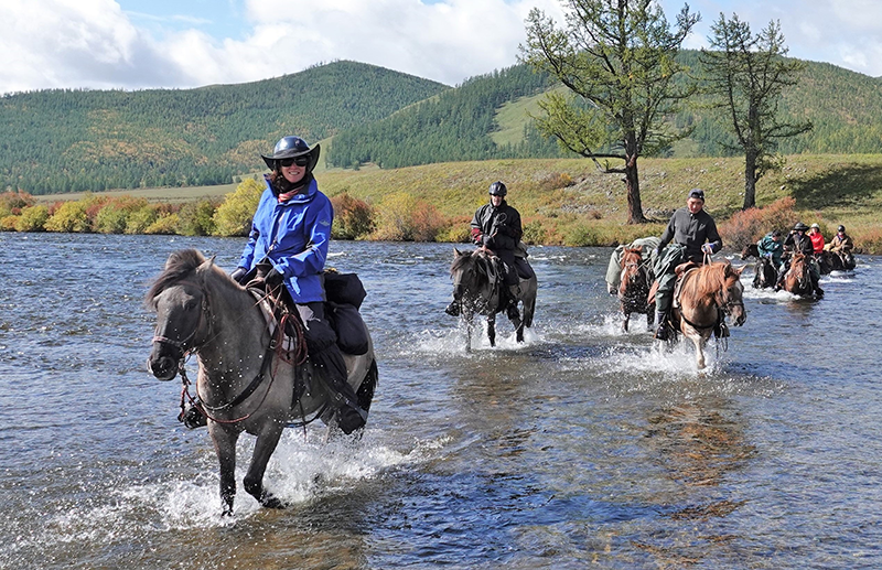 River crossings are part of the riding adventure on the 14 day Khentii Mountains wilderness expeditions