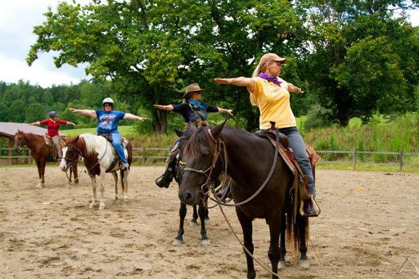 Stretching on Horseback Yoga Poses