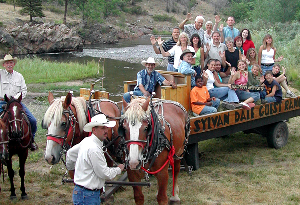 family wagon ride at sylvan dale guest ranch
